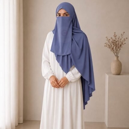A woman wearing a complete 3 piece hijab set with a niqab covering her face, leaving only eyes visible. The set includes an underscarf, outer scarf and separate niqab. By CLOTHIFYDOTPK