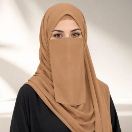 A woman wearing a complete 3 piece hijab set with a niqab covering her face, leaving only eyes visible. The set includes an underscarf, outer scarf and separate niqab. By CLOTHIFYDOTPK