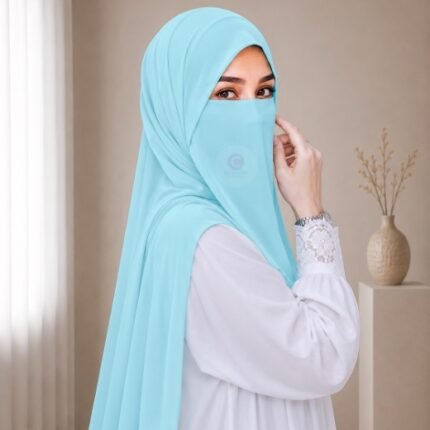 A woman wearing a complete 2 piece hijab set with a niqab covering her face, leaving only eyes visible. The set includes an Hijab and separate niqab. By CLOTHIFYDOTPK