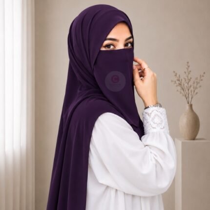 A woman wearing a complete 2 piece hijab set with a niqab covering her face, leaving only eyes visible. The set includes an Hijab and separate niqab. By CLOTHIFYDOTPK