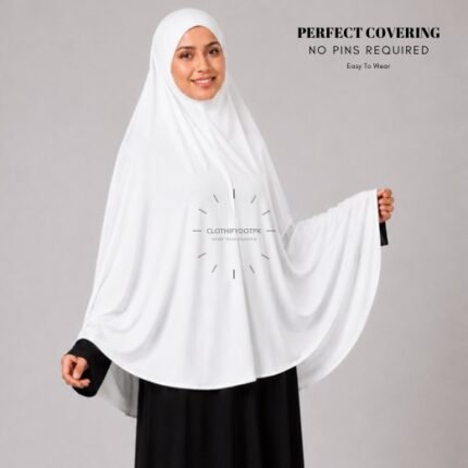 A woman wearing a Pearl White jersey Hajj and Umrah scarf – a Namaz Makhna hijab designed for head, neck and shoulder coverage without the need for pins. By CLOTHIFYDOTPK