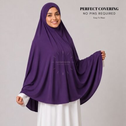 A woman wearing a Purple jersey Hajj and Umrah scarf – a Namaz Makhna hijab designed for head, neck and shoulder coverage without the need for pins. By CLOTHIFYDOTPK