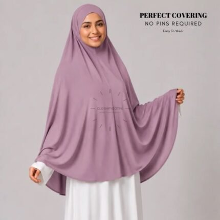 A woman wearing a Mauve jersey Hajj and Umrah scarf – a Namaz Makhna hijab designed for head, neck and shoulder coverage without the need for pins. By CLOTHIFYDOTPK