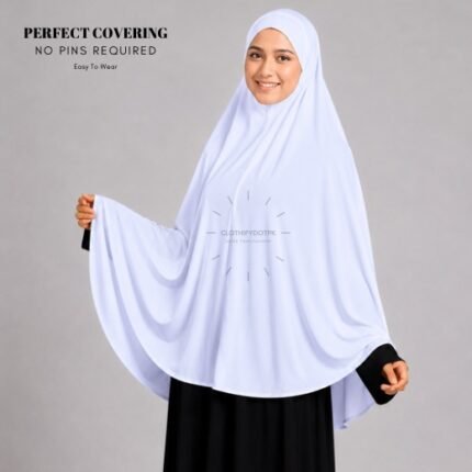 A woman wearing a Snow White jersey Hajj and Umrah scarf – a Namaz Makhna hijab designed for head, neck and shoulder coverage without the need for pins. By CLOTHIFYDOTPK