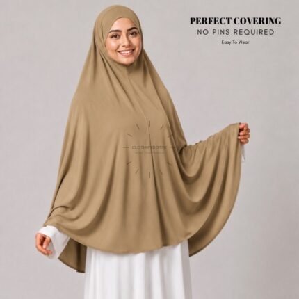 A woman wearing a Caramel jersey Hajj and Umrah scarf – a Namaz Makhna hijab designed for head, neck and shoulder coverage without the need for pins. By CLOTHIFYDOTPK