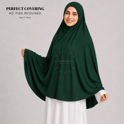 A woman wearing a Green jersey Hajj and Umrah scarf – a Namaz Makhna hijab designed for head, neck and shoulder coverage without the need for pins. By CLOTHIFYDOTPK