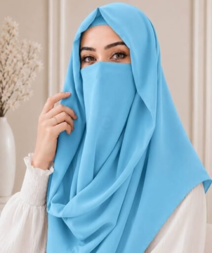 A woman wearing an elegant Misri style hijab set draped over the head and shoulders with attached Niqab for casual and formal occasions. BY CLOTHIFYDOTPK