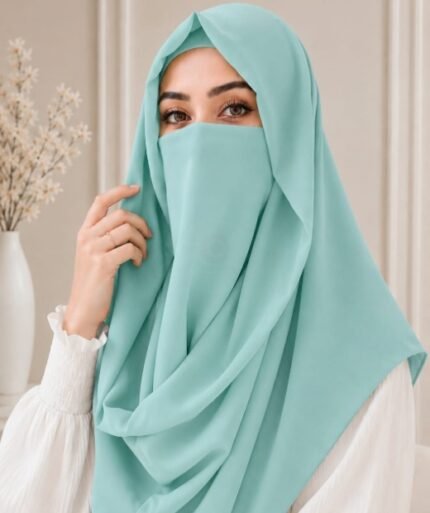 A woman wearing an elegant Misri style hijab set draped over the head and shoulders with attached Niqab for casual and formal occasions. BY CLOTHIFYDOTPK