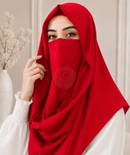Stylish woman wearing a luxury Misri hijab Niqab or ninja nectar set with coordinated underscarf and flowing drape. BY CLOTHIFYDOTPK