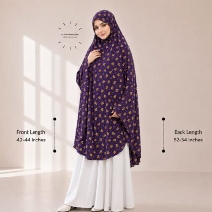 A woman draped in a soft Swiss lawn namaz chadar without sleeves with front coverage that falls above the knees, while the back extends down till knees. BY CLOTHIFYDOTPK