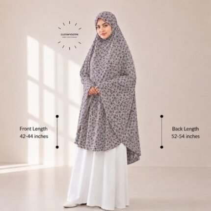 A woman draped in a soft Swiss lawn namaz chadar without sleeves also known as Makhna Hijab or Namaz Scarf with front coverage that falls above the knees, while the back extends down till knees. BY CLOTHIFYDOTPK