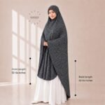Woman wearing a soft swiss lawn Namaz chadar without sleeves with front coverage reaching the knees and back extending below the knees. BY CLOTHIFYDOTPK