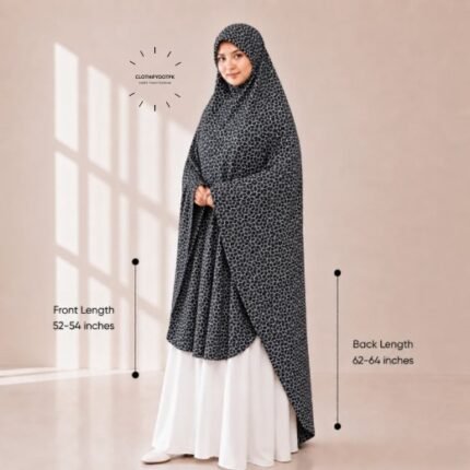 Woman wearing a soft swiss lawn Namaz chadar without sleeves with front coverage reaching the knees and back extending below the knees. BY CLOTHIFYDOTPK