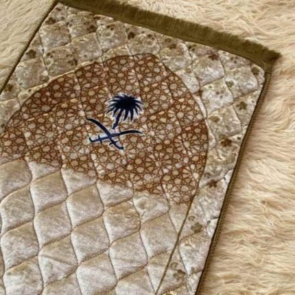 This beautifully designed, quilted prayer mat offers premium padding and is shown flat - courtesy of CLOTHIFYDOTPK.