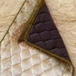 This beautifully designed, quilted prayer mat offers premium padding and is shown flat - courtesy of CLOTHIFYDOTPK.