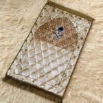 This beautifully designed, quilted prayer mat offers premium padding and is shown flat - courtesy of CLOTHIFYDOTPK.