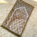 This beautifully designed, quilted prayer mat offers premium padding and is shown flat - courtesy of CLOTHIFYDOTPK.