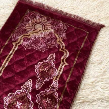 This beautifully designed, quilted prayer mat offers premium padding and is shown flat - courtesy of CLOTHIFYDOTPK.
