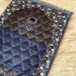 This beautifully designed, quilted prayer mat offers premium padding and is shown flat - courtesy of CLOTHIFYDOTPK.