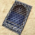 This beautifully designed, quilted prayer mat offers premium padding and is shown flat - courtesy of CLOTHIFYDOTPK.