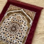 This beautifully designed, quilted prayer mat offers premium padding and is shown flat - courtesy of CLOTHIFYDOTPK.