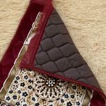 This beautifully designed, quilted prayer mat offers premium padding and is shown flat - courtesy of CLOTHIFYDOTPK.
