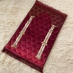 This beautifully designed, quilted prayer mat offers premium padding and is shown flat - courtesy of CLOTHIFYDOTPK.