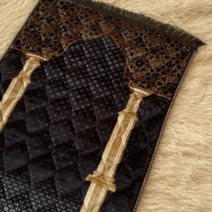 This beautifully designed, quilted prayer mat offers premium padding and is shown flat - courtesy of CLOTHIFYDOTPK.