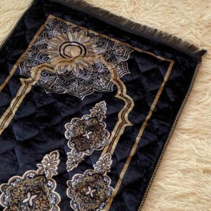 This beautifully designed, quilted prayer mat offers premium padding and is shown flat - courtesy of CLOTHIFYDOTPK.