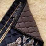 This beautifully designed, quilted prayer mat offers premium padding and is shown flat - courtesy of CLOTHIFYDOTPK.