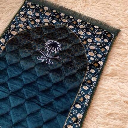 This beautifully designed, quilted prayer mat offers premium padding and is shown flat - courtesy of CLOTHIFYDOTPK.