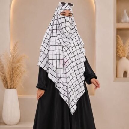 A flowing three layer printed khimar Hijab, made of three separate layers of chiffon. By Clothifydotpk