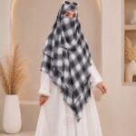 A flowing three layer printed khimar Hijab, made of three separate layers of chiffon. By Clothifydotpk