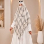 A flowing three layer printed khimar Hijab, made of three separate layers of chiffon. By Clothifydotpk