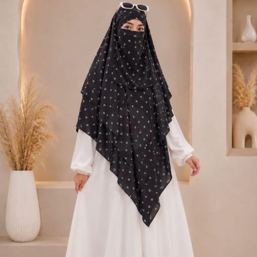 A flowing three layer printed khimar Hijab, made of three separate layers of chiffon. By Clothifydotpk