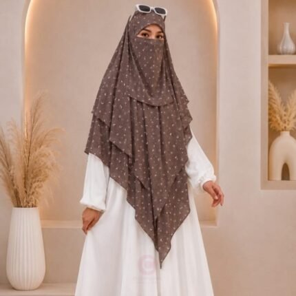 A flowing three layer printed khimar Hijab, made of three separate layers of chiffon. By Clothifydotpk