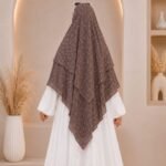 A flowing three layer printed khimar Hijab, made of three separate layers of chiffon. By Clothifydotpk