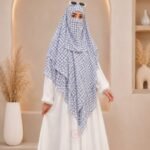A flowing three layer printed khimar Hijab, made of three separate layers of chiffon. By Clothifydotpk