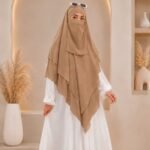 A flowing three layer khimar Hijab, made of three separate layers of chiffon. By Clothifydotpk