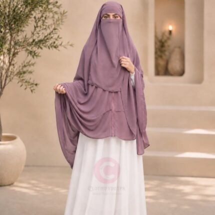 Woman wearing a mauve zipper hijab with niqab, easy one-step closure for modest wear. By CLOTHIFYDOTPK