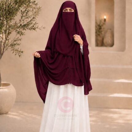 Woman wearing a mulberry zipper hijab with niqab, easy one-step closure for modest wear. By CLOTHIFYDOTPK