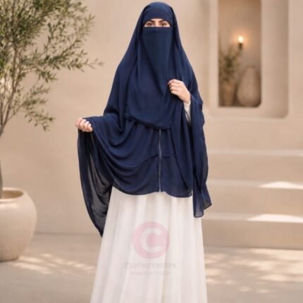 Woman wearing a navy blue zipper hijab with niqab, easy one-step closure for modest wear. By CLOTHIFYDOTPK