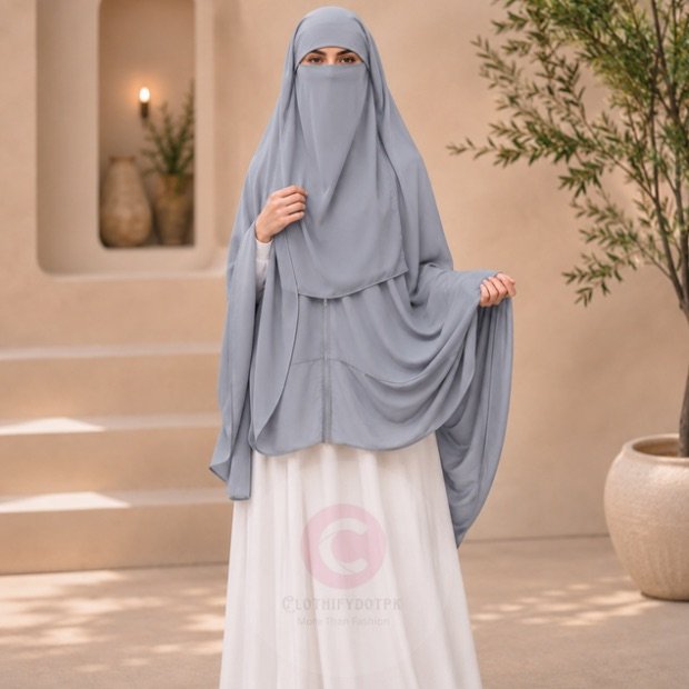 Woman wearing a gray color zipper hijab with niqab, easy one-step closure for modest wear. By CLOTHIFYDOTPK