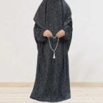 Woman standing wearing printed arabic namaz chadar holding prayer beads full coverage and comfort without compromising style. BY CLOTHIFYDOTPK