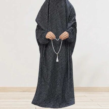 Woman standing wearing printed arabic namaz chadar holding prayer beads full coverage and comfort without compromising style. BY CLOTHIFYDOTPK