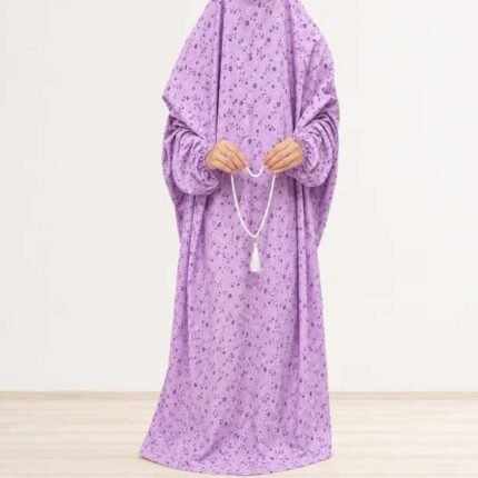 Woman standing wearing printed arabic namaz chadar holding prayer beads full coverage and comfort without compromising style. BY CLOTHIFYDOTPK