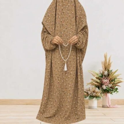 Woman standing wearing printed arabic namaz chadar holding prayer beads full coverage and comfort without compromising style. BY CLOTHIFYDOTPK