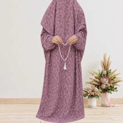 Woman standing wearing printed arabic namaz chadar holding prayer beads full coverage and comfort without compromising style. BY CLOTHIFYDOTPK