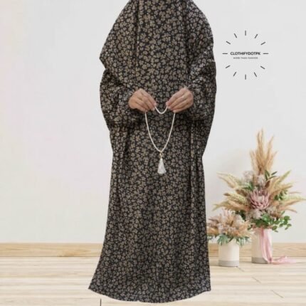 Women's wearing printed Saudi Style namaz chadar – full coverage modest Islamic prayer outfit combining comfort and style. Premium quality abaya-style namaz chadar for Muslim women praying at home or mosque. Available at CLOTHIFYDOTPK.