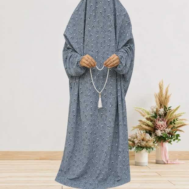 Arabic Namaz Chadar_N23 - 7 Woman standing wearing printed arabic namaz chadar holding prayer beads full coverage and comfort without compromising style. BY CLOTHIFYDOTPK